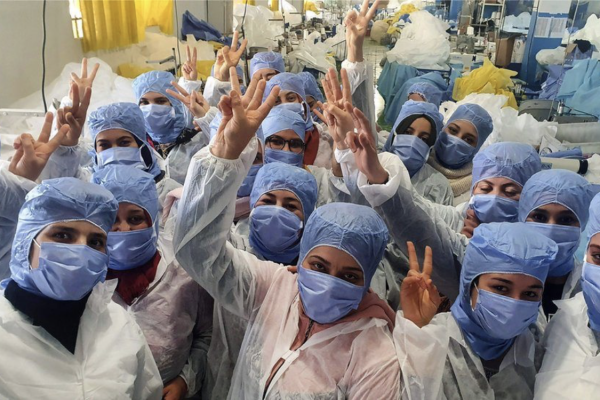 Coronavirus: 150 Tunisians self-isolate in factory to make masks